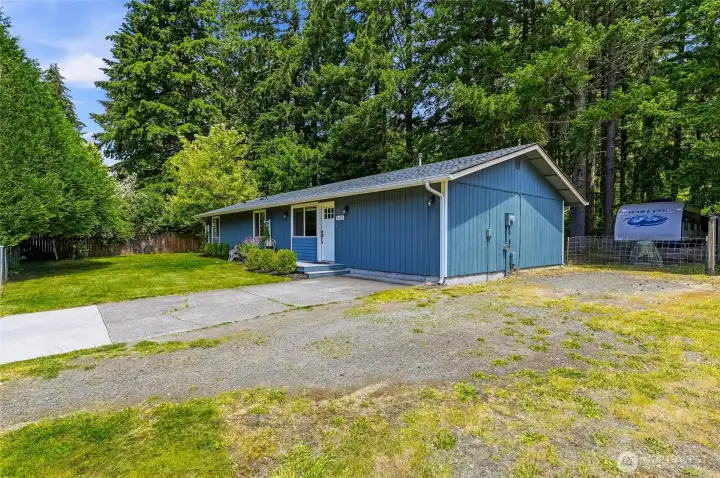 Lots of room for parking in front and side, with RV/boat/trailer parking on back-side of home. Lots of room for parking in front and side, with RV/boat/trailer parking on back-side of home.