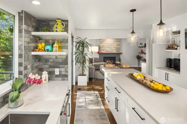 Extra large Island with additional storage.  Note the handy coffee beverage space to the right.