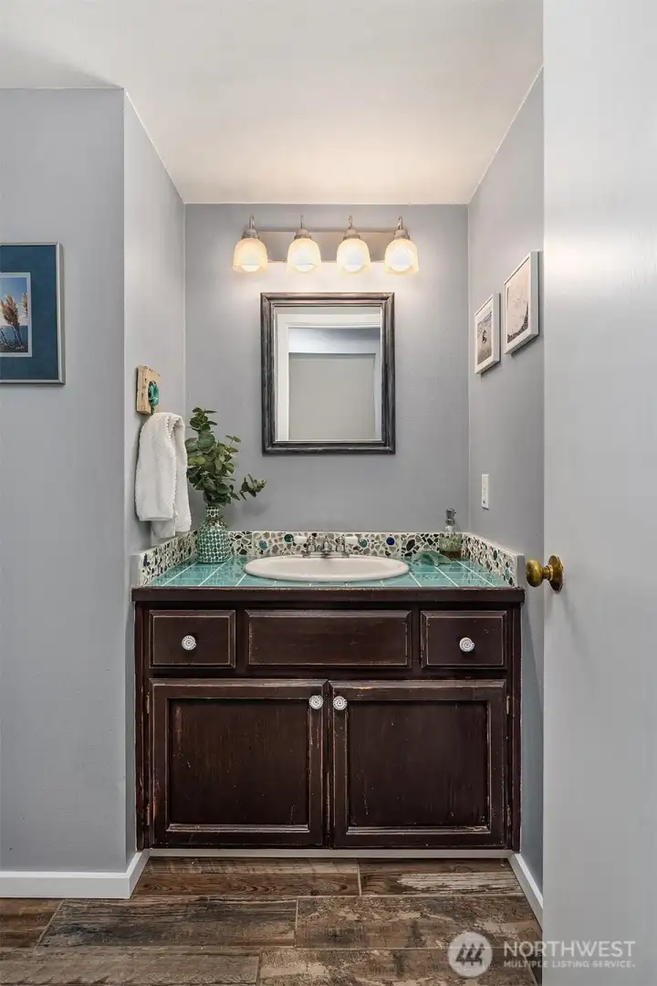 Charming main floor powder room.