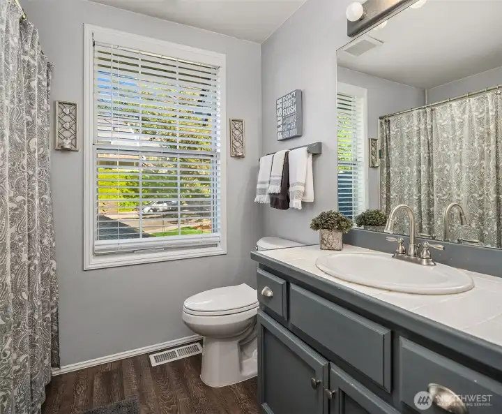 Upper second full bathroom.