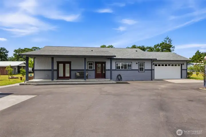 Custom-built 1-story  with 2-car attached garage and solar panels