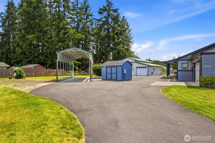 RV Spots, Well House, 1,920 sf shop and custom-built 1-story home!