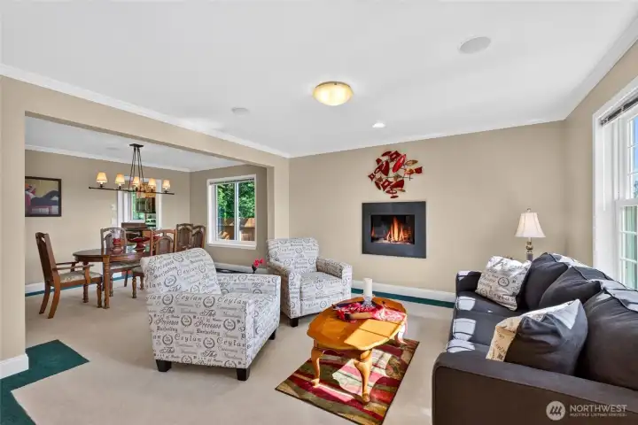 Formal living and dining rooms with new fireplace Formal living and dining rooms with new fireplace