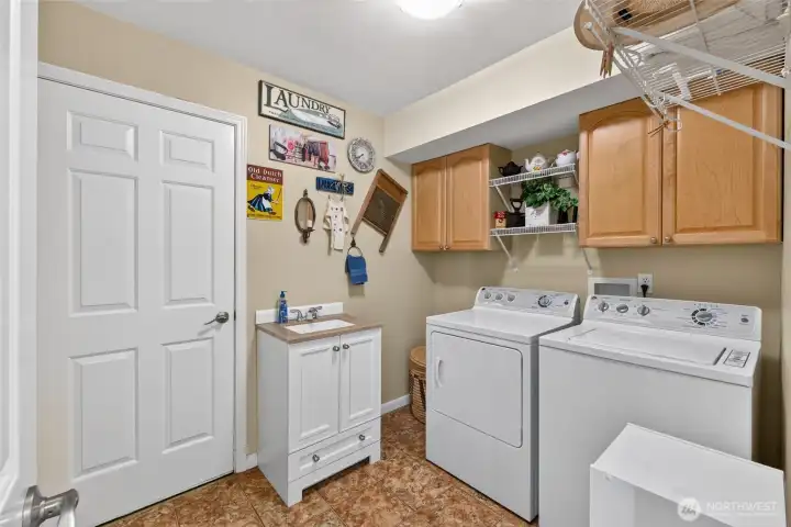 Main floor laundry leads to oversized 2 car garage Main floor laundry leads to oversized 2 car garage
