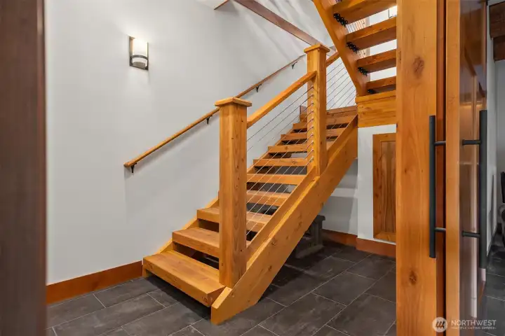 Floating Staircase with Barn doors to rec room