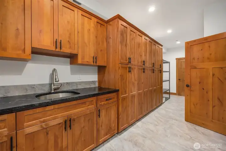 Wall to wall cabinets and storage closet