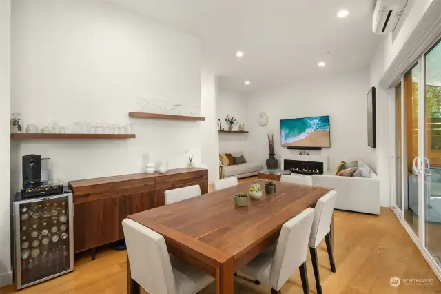 The dining area off the kitchen is flooded with natural light.