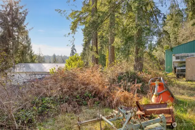 Access easement is on the left side. Garage and equipment are NOT part of this property.