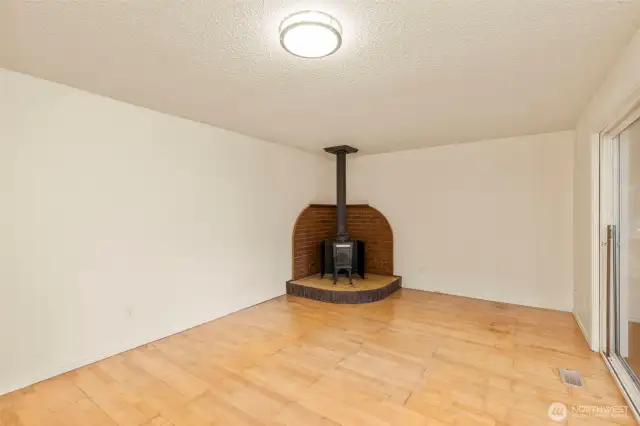 Cozy up for movie nights in the family room with a toasty wood stove, and plenty of space for fun!