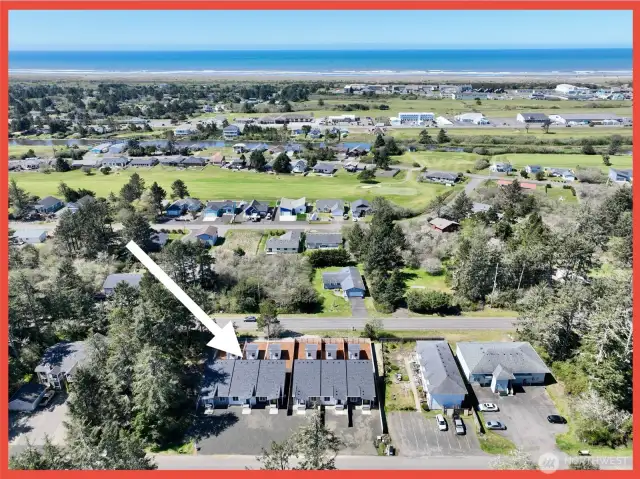 Conveniently located near town center, beach access, golf course, and lakefront park.