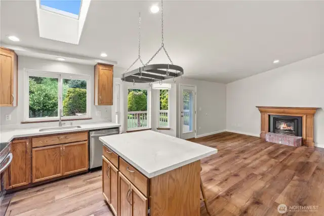 valuted ceilings & skylight provide tons of natural light