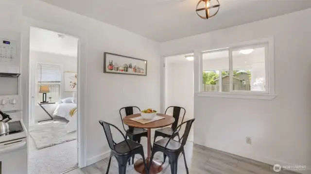 Quaint dining space perfect for intimate meals and casual gatherings, offering just the right amount of room for comfortable dining