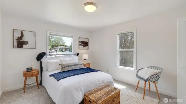 Brand-new carpeting throughout the house adds a fresh touch to both bedrooms and beyond