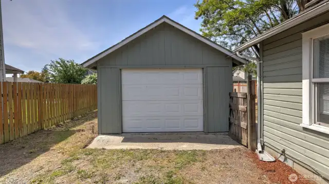 Charming detached one-car garage—ideal for extra storage, bikes or work tools