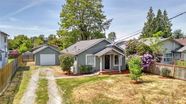 Enjoy a generously sized front yard with open space perfect for gardening and landscaping