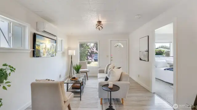 Bathed in natural light, this living room creates a bright and welcoming space!