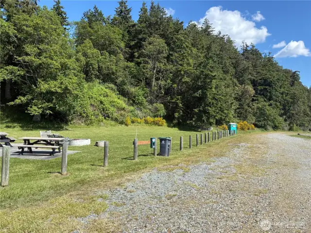 A fire pit, picnic area, community monitored garbage, even a porta-potty!  A hose and running water to rinse your boat off when you come in for the day.