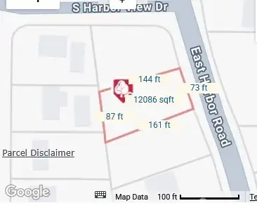 The lot is 73' wide at the street, 144' long on the north side, 87' wide at the west end, and 161' long on the south side, per public records.