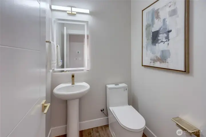 downstairs 1/2 bath (model home lot 1A, colors may vary)