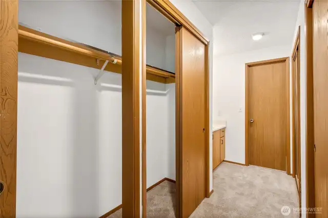 Ample closet space and storage in primary bedroom