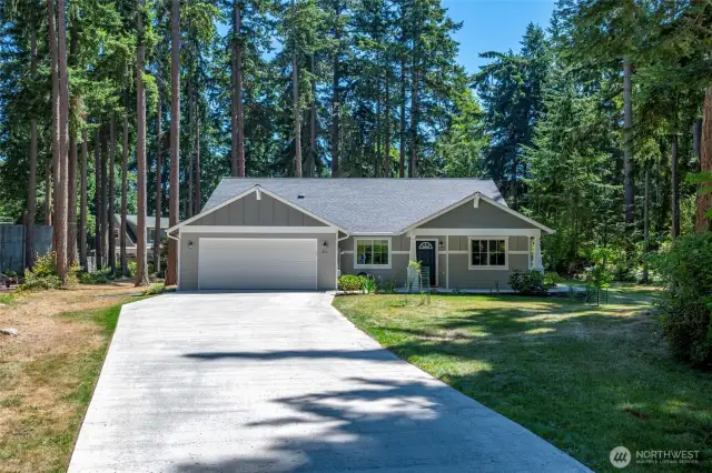 This house has it all! A hundred percent wheelchair accessible, landscaped yard, quiet neighborhood, and level, cleared nearly 1/2 acre of beautiful island living.