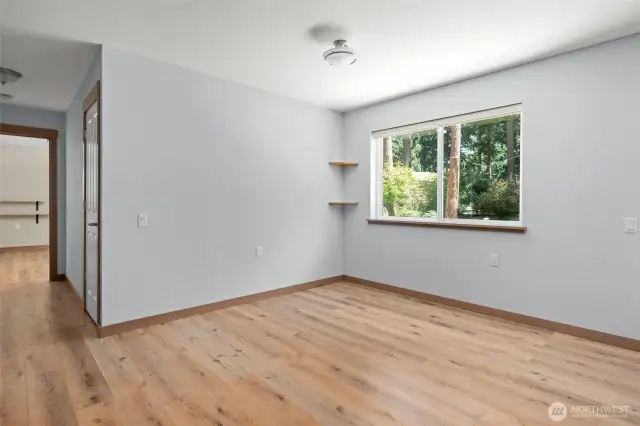 Spacious dining area, the large window draws in plenty of outdoor light.