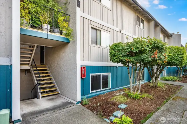 Unit #5 is down the stairs and to your right, a lovely ground floor condo with only 4 stairs to the front door!