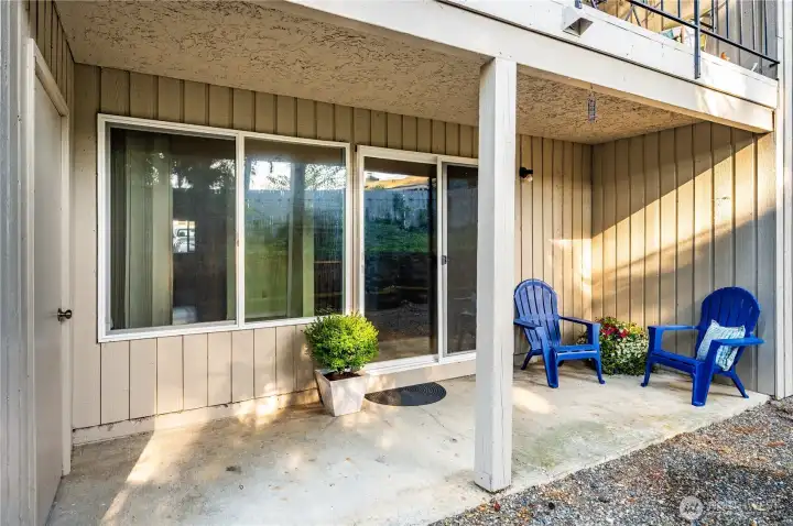 Stepping outside, you can see the large covered patio, an extension of the home's living space.
