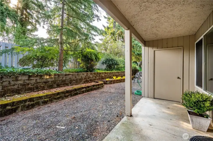 Ground floor living offers many benefits, especially for a pet to easily go outside. The door at the end of the patio is exterior storage.