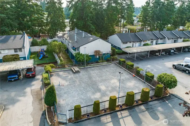 Winchester Heights features a fully fenced sport court, ideal for outdoor play and little bikes any time of the year.