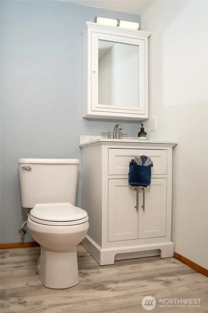Newly remodeled 1/2 bath on lower level.