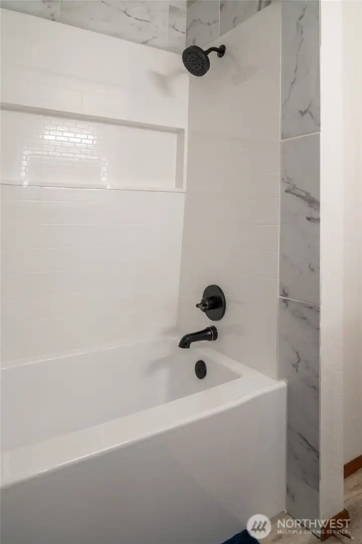 Upstairs full bath. Tasteful and elegant, just like the rest of the home.