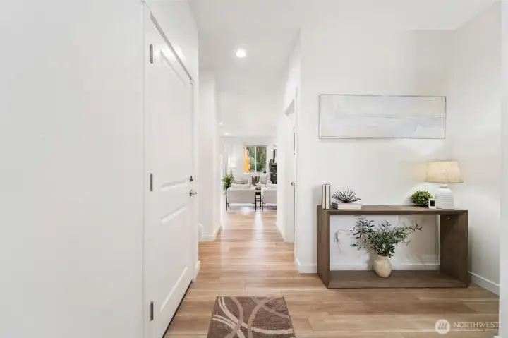 Spacious foyer with coat closet