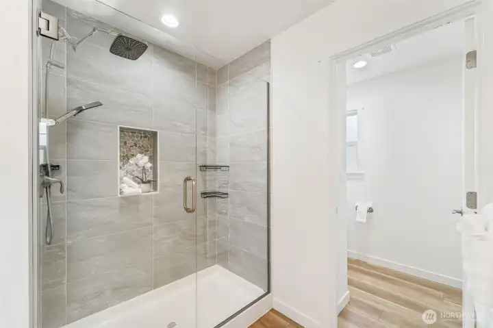 Designer shower with tile and stone