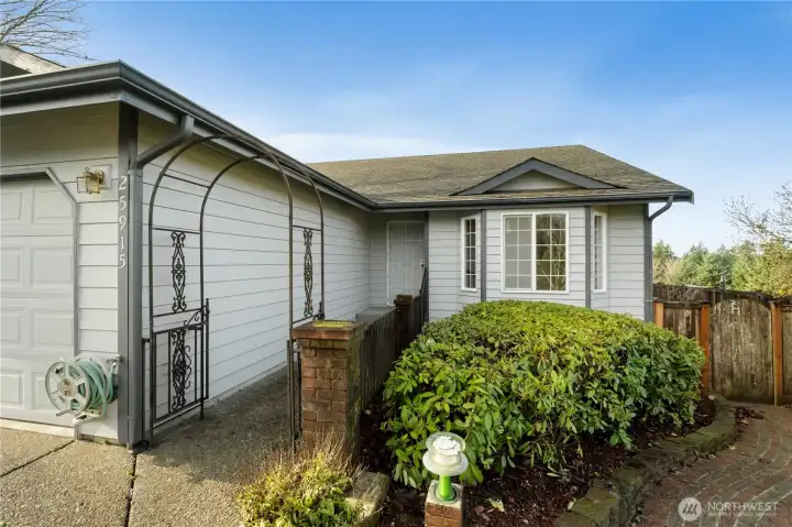 Easily maintained yard with mature plants