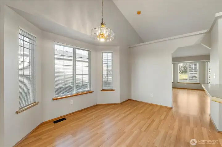 Kitchen nook with large bay windows