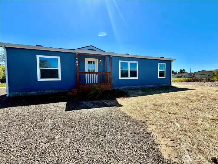 Front of home, plenty of parking, RV hookups and possible garage space