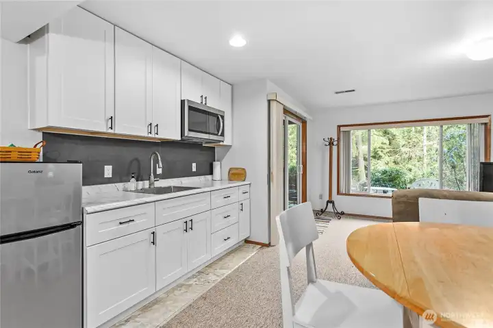 Daylight basement - kitchenette.  The lower level is the perfect space for multi-generational living, guest accomadations, or to rent out