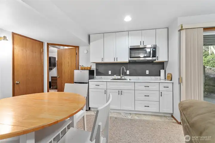 Daylight basement - kitchenette.  The lower level is the perfect space for multi-generational living, guest accomadations, or to rent out