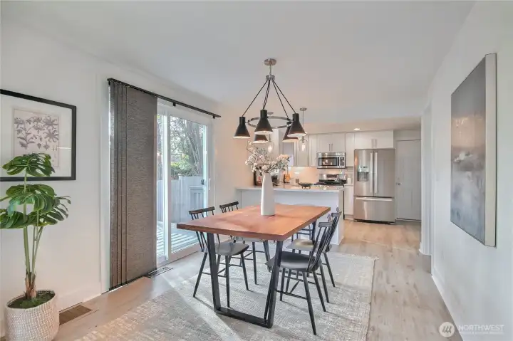 An abundance of natural light fills the dining/living room.