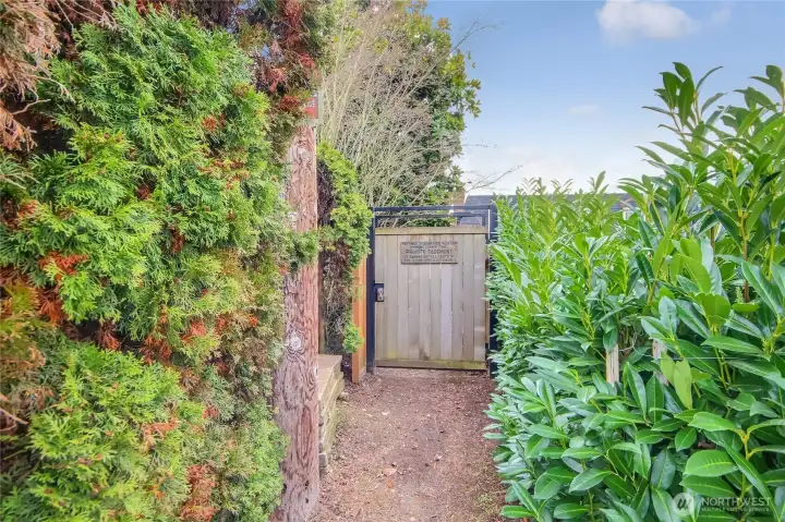 The gated entrance to the community beach is mere blocks away.