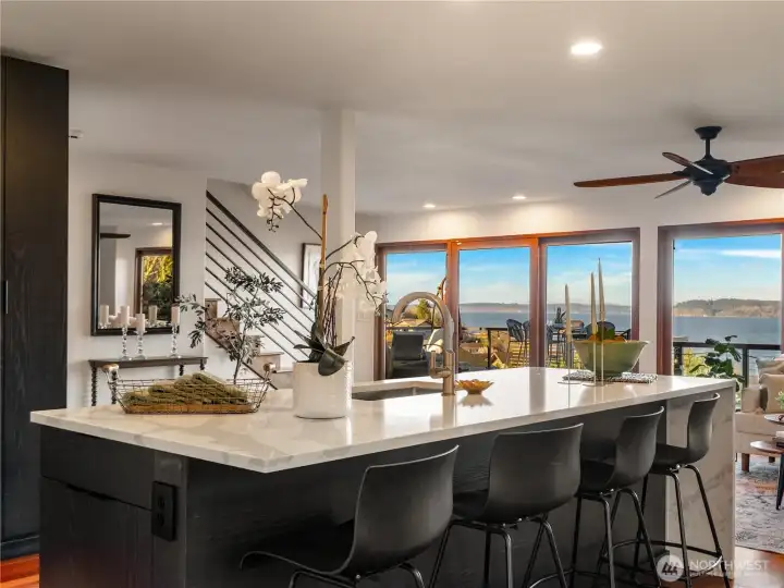 The waterfall island has room for at least four to hang out with the cook or to have breakfast.