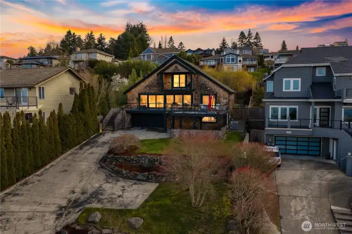 Two car garage and two car carport underneath the deck.