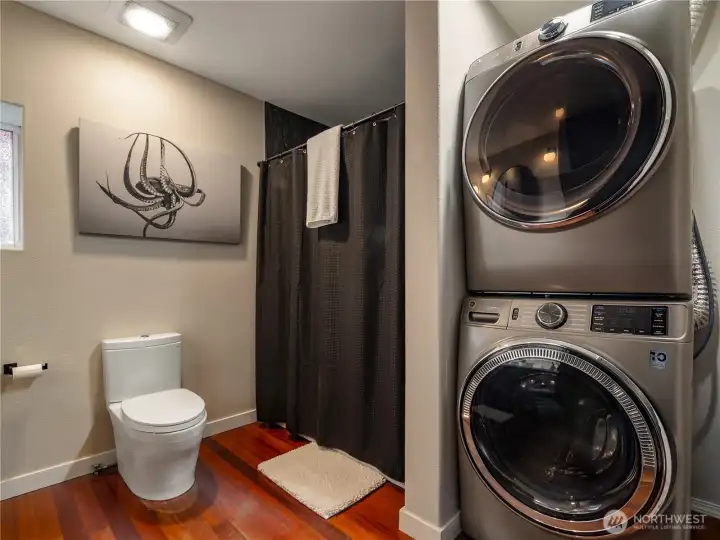The main floor bathroom also have high capacity laundry equipment.