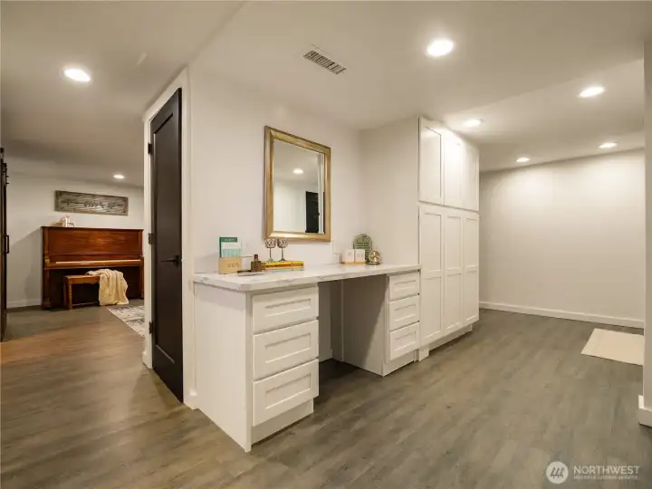 The built in desk area allows for someone to work from home or do home work in a convenient space.