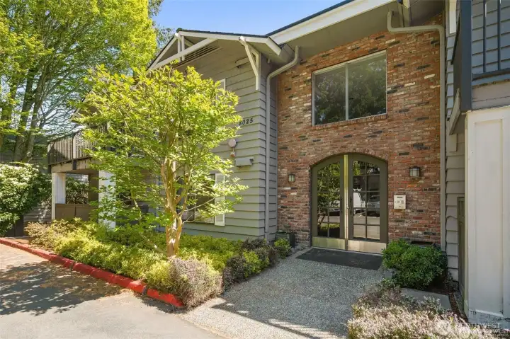 Entrance to building with call box. Mailboxes also located just inside this entry.