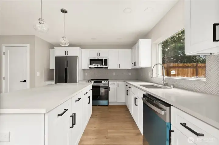 Luxury kitchen with ample storage and eating island.