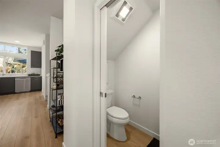 Conveniently located main living space powder room
