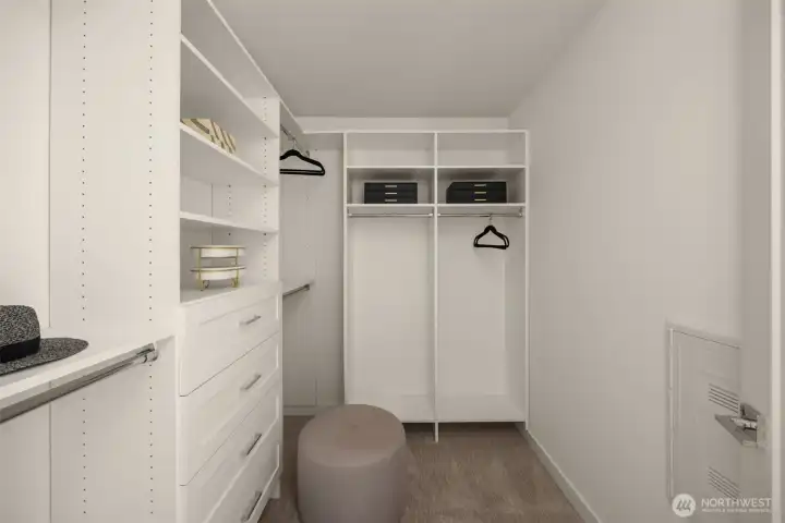 Additional walk-in closet with built-in shelving!