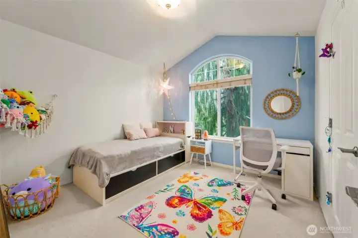 One of three spacious bedrooms on the upper floor